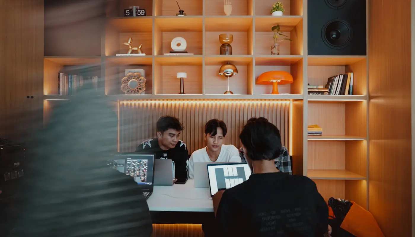 Creative team reviewing an explainer video cut together on screen