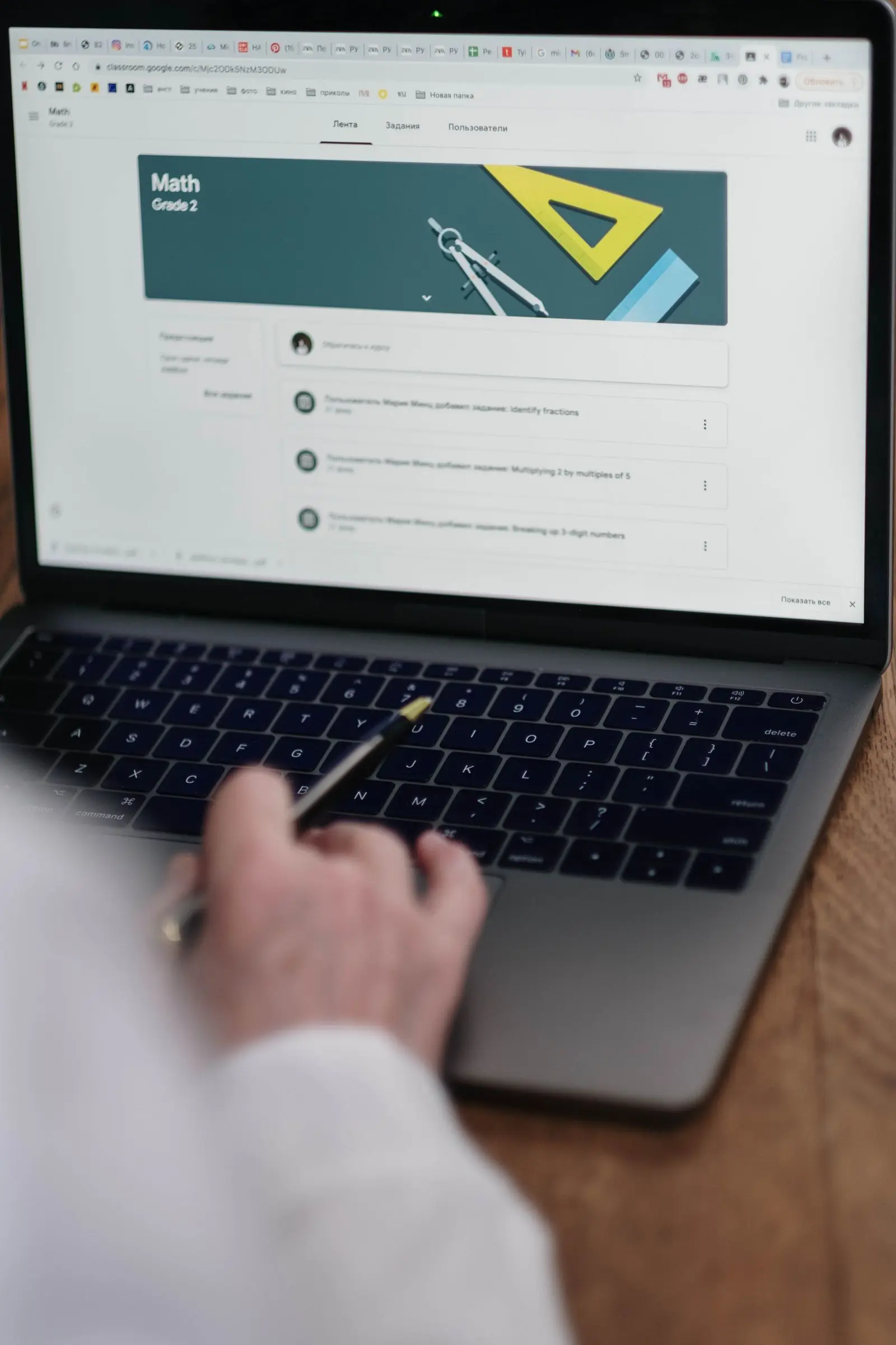Employee completing an AI training video module on a laptop inside an LMS