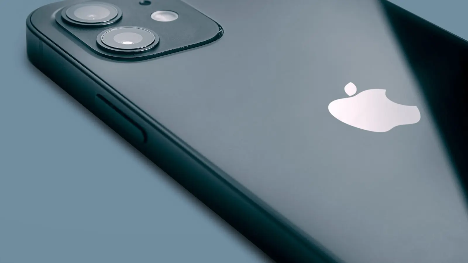 A premium smartphone product shot with cinematic lighting — the kind of app launch promo video ArcaneWiz produces for the App Store and paid social