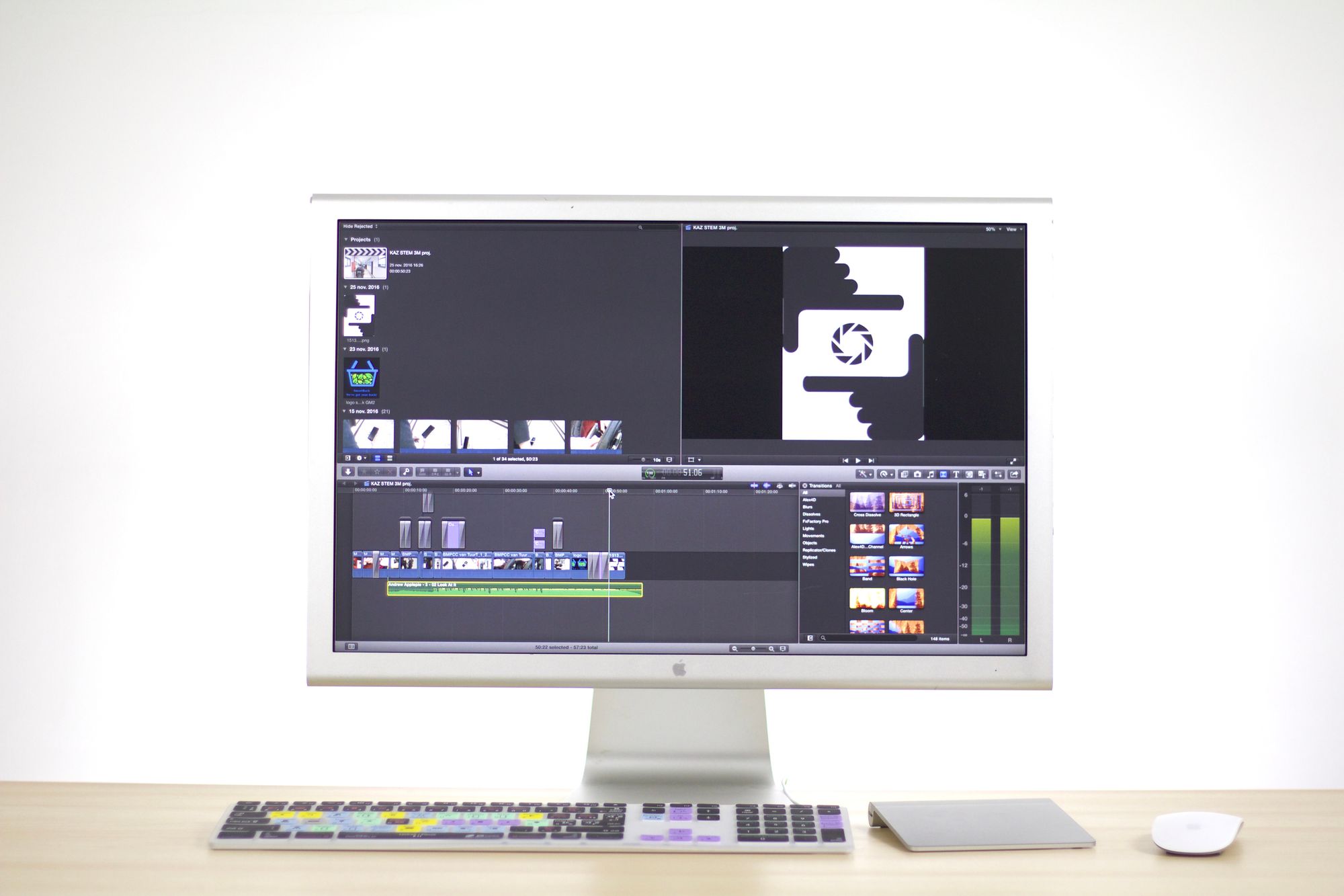 A video editing timeline open on a bright studio monitor during post-production, where the pitch film's traction sequence, grade and sound mix are assembled
